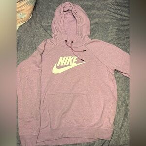 Light purple NIKE sweatshirt, size medium.